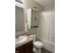 Bathroom featuring a combination shower and tub, a vanity with storage, and neutral colors at 1820 Irish Lake Ln, Indianapolis, IN 46239