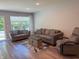 Cozy living room showcasing comfortable seating and stylish decor on an attractive floor at 1820 Irish Lake Ln, Indianapolis, IN 46239