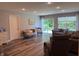 Spacious living room features neutral paint and stylish furniture with lots of natural light at 1820 Irish Lake Ln, Indianapolis, IN 46239