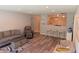 Cozy living room with stylish furnishings and an open view into the kitchen area at 1820 Irish Lake Ln, Indianapolis, IN 46239