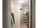 Walk-in closet with shelving and hanging storage, offering ample space for organization at 1820 Irish Lake Ln, Indianapolis, IN 46239