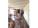 Comfortable living area featuring wood floors and a sitting area perfect for relaxation and social gatherings at 206 Allen Ln, Greenfield, IN 46140