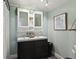 Charming bathroom features double sinks, a vanity cabinet, and decorative accents at 211 N County Line Rd, , IN 47272