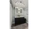Well lit bathroom with double sinks, decorative accents, and large vanity at 211 N County Line Rd, , IN 47272