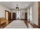 Bright living room features hardwood floors, a decorative rug, and plenty of natural light at 211 N County Line Rd, , IN 47272