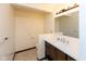 Bathroom with updated vanity, modern fixtures, and a neutral color palette at 220 E Tilden Dr, Brownsburg, IN 46112