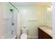 Cozy bathroom featuring shower over tub, and vanity with neutral countertops at 220 E Tilden Dr, Brownsburg, IN 46112