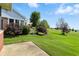 Well maintained backyard with golf course views and a garden area at 2251 Somerset Dr, Franklin, IN 46131