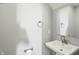 Bathroom sink with chrome faucet and wall mirror with neutral walls at 2251 Somerset Dr, Franklin, IN 46131