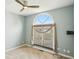 Bedroom boasts a ceiling fan and a large window with bamboo blinds at 2251 Somerset Dr, Franklin, IN 46131