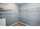 Walk-in closet features a wire shelving system and neutral carpet at 2251 Somerset Dr, Franklin, IN 46131