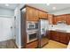 Kitchen features stainless steel appliances and dark wood cabinetry at 2251 Somerset Dr, Franklin, IN 46131