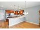 Bright kitchen with stainless steel appliances, island, and modern finishes at 2251 Somerset Dr, Franklin, IN 46131