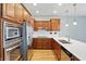 Kitchen island with stainless dishwasher, sink, and pendant lighting at 2251 Somerset Dr, Franklin, IN 46131