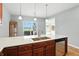 Kitchen with double sink, stainless dishwasher, and outdoor view at 2251 Somerset Dr, Franklin, IN 46131