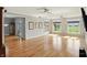 Spacious living room featuring hardwood floors and lots of natural light from large windows at 2251 Somerset Dr, Franklin, IN 46131