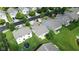 Aerial view of a suburban home featuring a well-manicured lawn and backyard play area at 2253 Bridlewood Dr, Franklin, IN 46131