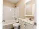 Bathroom featuring a tub and shower combo with new vanity and mirror at 2350 E Legrande Ave, Indianapolis, IN 46203