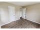 A bedroom featuring new wood laminate flooring and neutral paint at 2350 E Legrande Ave, Indianapolis, IN 46203