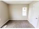 A bedroom featuring new wood laminate flooring at 2350 E Legrande Ave, Indianapolis, IN 46203
