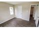 A bedroom featuring new wood laminate flooring and neutral paint at 2350 E Legrande Ave, Indianapolis, IN 46203