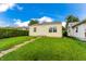 Quaint single-story home with a manicured lawn, and convenient walkway at 2350 E Legrande Ave, Indianapolis, IN 46203