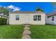 Cozy single-story home with a well-manicured lawn and inviting entrance at 2350 E Legrande Ave, Indianapolis, IN 46203