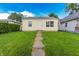 Charming single-story home featuring a walkway, fresh lawn, and neutral siding at 2350 E Legrande Ave, Indianapolis, IN 46203