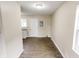 Hallway featuring sleek modern flooring, and neutral walls at 2350 E Legrande Ave, Indianapolis, IN 46203