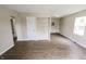 Open living space with modern flooring and fresh paint, ready for personalization at 2350 E Legrande Ave, Indianapolis, IN 46203