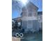 Two-story home with faded paint and a small front porch at 2519 N A St, Elwood, IN 46036