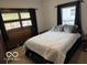 This bedroom has a large window for natural light at 2830 Guilford Ave, Indianapolis, IN 46205