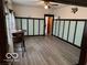 Spacious dining area featuring classic wall accents and durable wood-look floors at 2830 Guilford Ave, Indianapolis, IN 46205