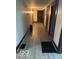 Hallway with neutral paint and wood trim at 2830 Guilford Ave, Indianapolis, IN 46205