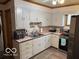 Kitchen with updated appliances and countertop space at 2830 Guilford Ave, Indianapolis, IN 46205