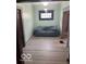 This living room features wood floors and a cozy atmosphere at 2830 Guilford Ave, Indianapolis, IN 46205