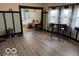 Living room with wood floor, natural light, and archway at 2830 Guilford Ave, Indianapolis, IN 46205