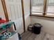 A utility area featuring a metal trash can, propane tank and other items at 2830 Guilford Ave, Indianapolis, IN 46205