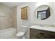 Modern bathroom featuring a tub, shower, and elegant fixtures, creating a luxurious space for relaxation and personal care at 3210 Hovey St, Indianapolis, IN 46218