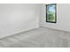 Bright bedroom with neutral walls and plush carpet, providing a blank canvas for personalization and comfortable living at 3210 Hovey St, Indianapolis, IN 46218