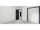 Bright bedroom featuring closet space and neutral paint, creating a peaceful retreat for relaxation and rejuvenation at 3210 Hovey St, Indianapolis, IN 46218