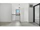 Bright hallway featuring modern lighting, neutral paint, and sleek floors, creating a welcoming entrance to the home at 3210 Hovey St, Indianapolis, IN 46218