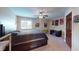Cozy bedroom with a large bed, ceiling fan, desk, and playful wall art at 3306 Mullinix Rd, Greenwood, IN 46143