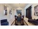 Dining room with chandelier, modern decor, and view to staircase at 3306 Mullinix Rd, Greenwood, IN 46143