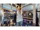 Elegant foyer with a curved staircase, gleaming floors, and soaring ceilings creating a grand entrance at 3306 Mullinix Rd, Greenwood, IN 46143