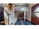 Elegant foyer with a curved staircase and chandelier at 3306 Mullinix Rd, Greenwood, IN 46143