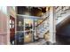 Grand foyer features a striking staircase, high ceilings, and unique flooring, creating an impressive entryway at 3306 Mullinix Rd, Greenwood, IN 46143
