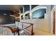 Second floor hallway with decorative railings and arched architectural designs on the walls at 3306 Mullinix Rd, Greenwood, IN 46143