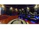 Home theater with large screen and reclining seats provides an immersive viewing experience, perfect for movie nights at 3306 Mullinix Rd, Greenwood, IN 46143
