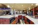 A kitchen with two islands, stainless appliances, granite countertops, and dark cabinetry at 3306 Mullinix Rd, Greenwood, IN 46143
